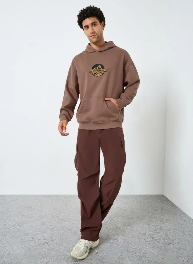 ستايلي هودي مطرز بقصة واسعة